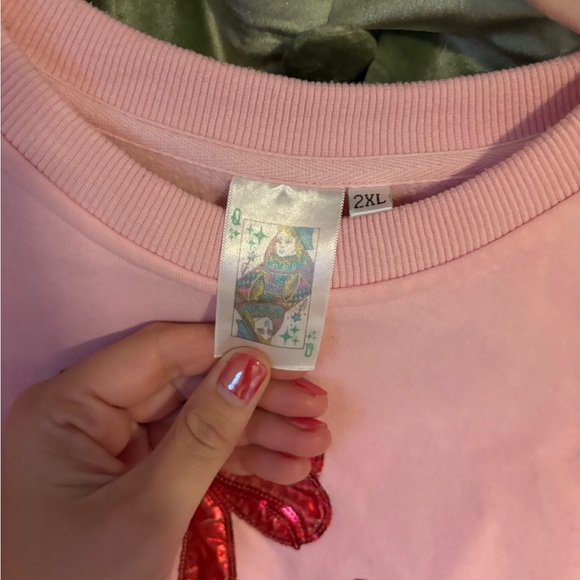 QUEEN OF SPARKLES Pink Sweatshirt with Red Bow Accents - Picture 2 of 2